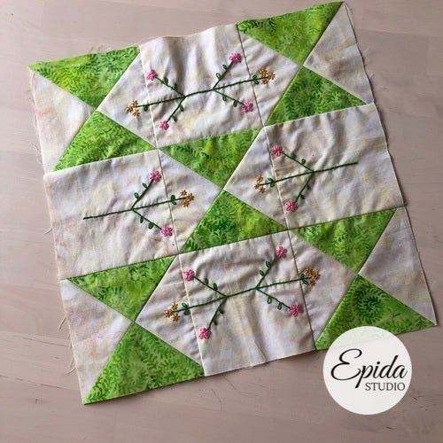 clown's choice quilt block with hand embroidery,