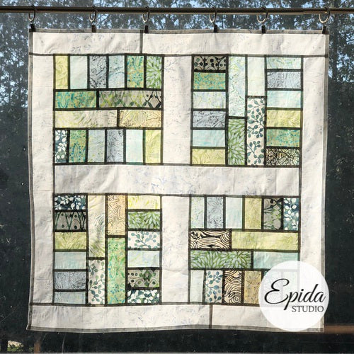 square batik window hanging.