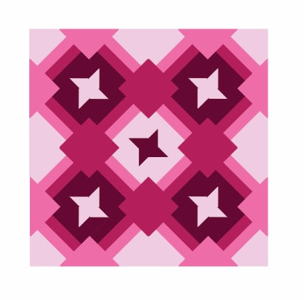 small Friendship Trails quilt in shades of pink.