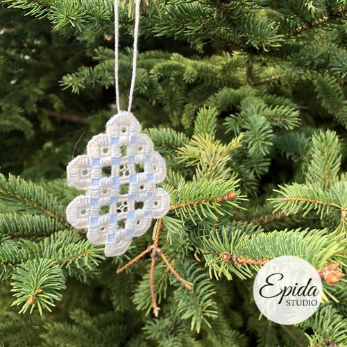 hardanger ornament in tree.