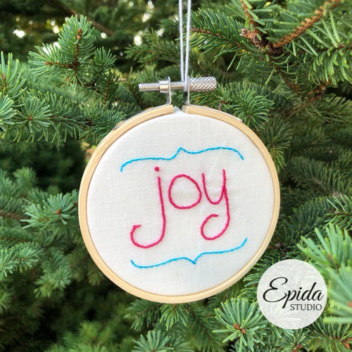"joy" Christmas ornament.