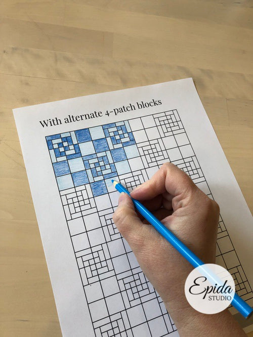hand colouring a quilt diagram.