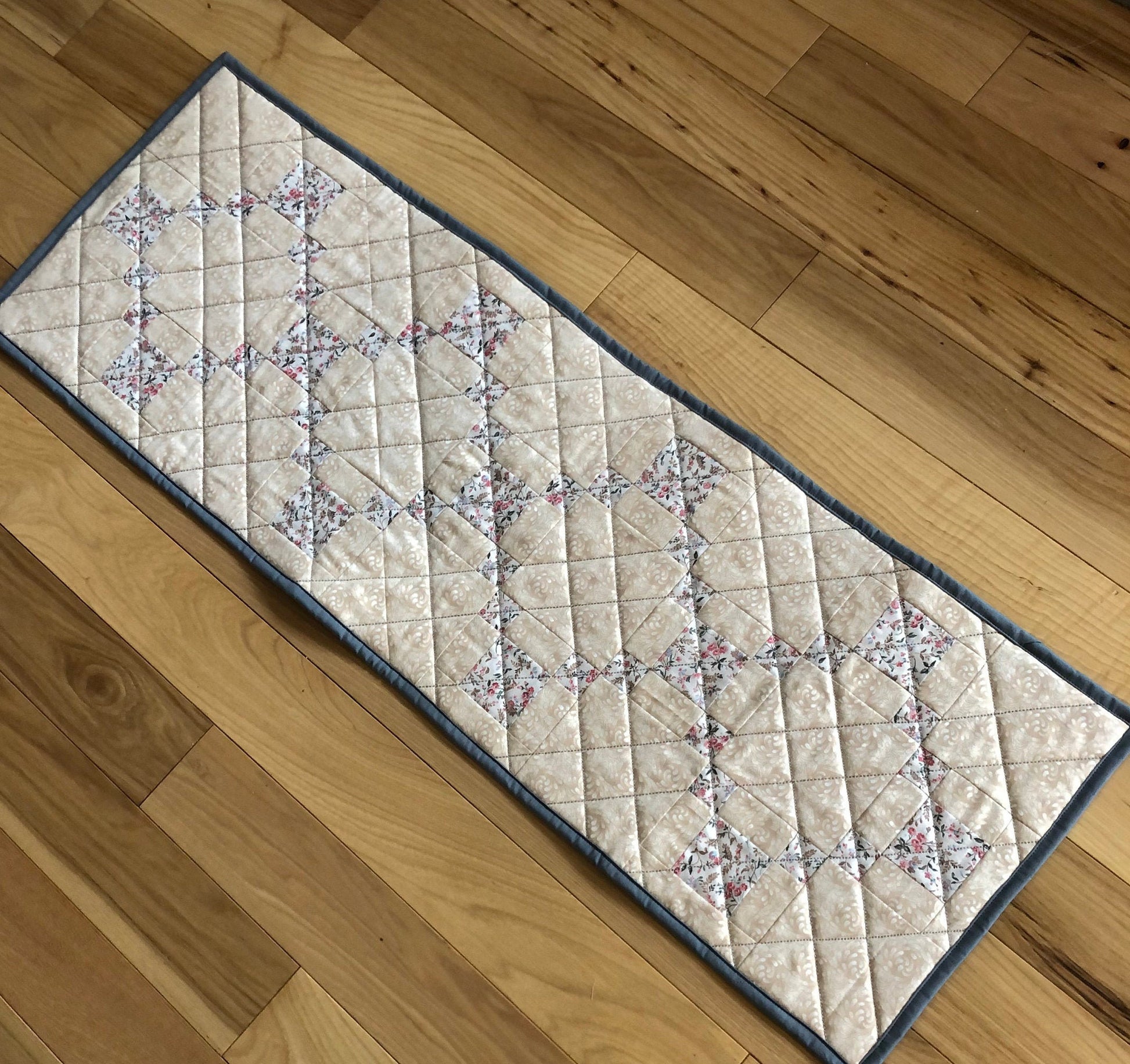 table runner with neutral colours.