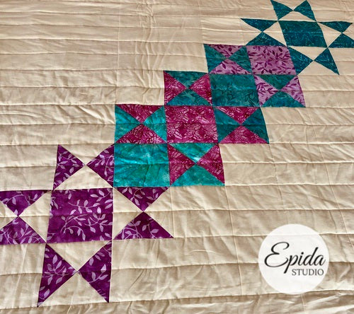 close up of star cascade on Not in Ohio Anymore quilt.