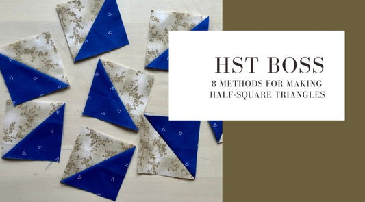A guide cover titled 'HST BOSS: 8 METHODS FOR MAKING HALF-SQUARE TRIANGLES' with several blue and floral half-square triangle fabric samples arranged on a light wood surface beside the title card.