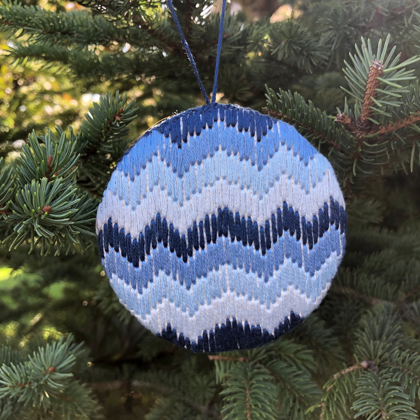 blue embroidered ornament.