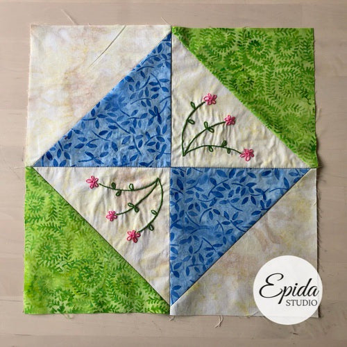 blue and green broken dishes quilt block.