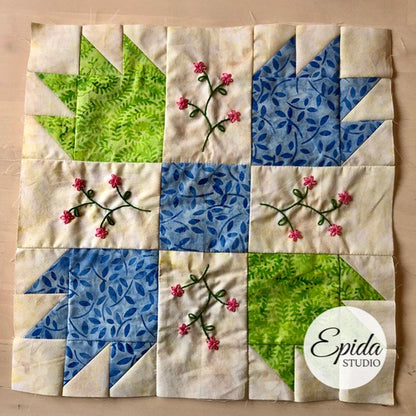 bear paw quilt block with embroidery.