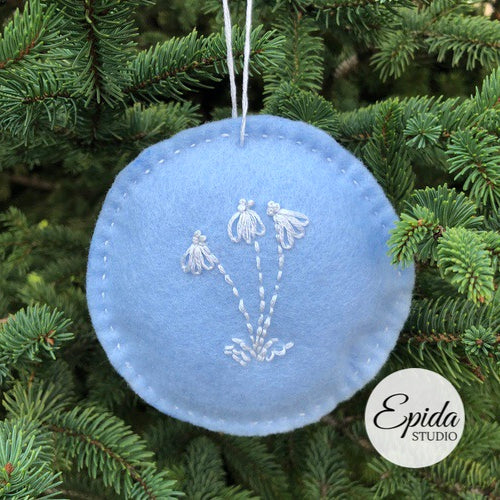 hand-stitched Christmas ornament.