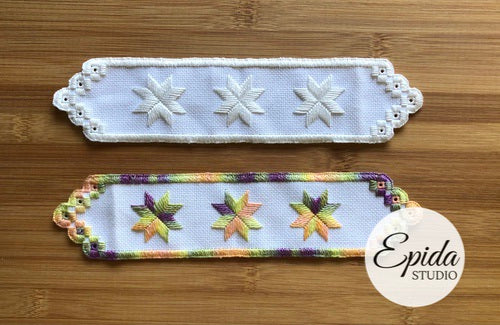 two hardanger bookmarks in white and colour.