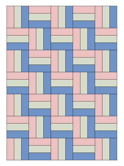 long version of rail fence quilt in blue and pink.