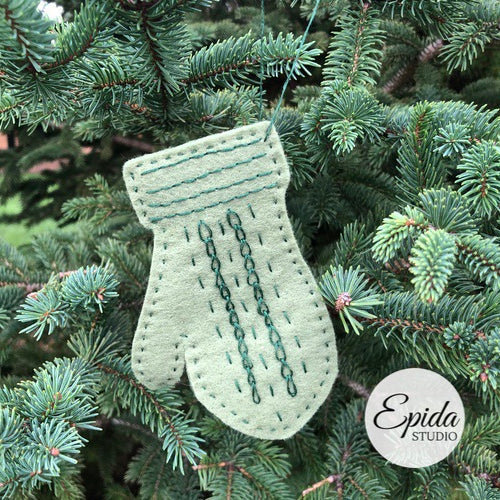 hand embroidered mitten ornament.