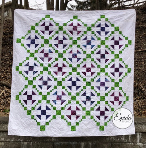 quilt with shoo fly blocks and chain blocks.