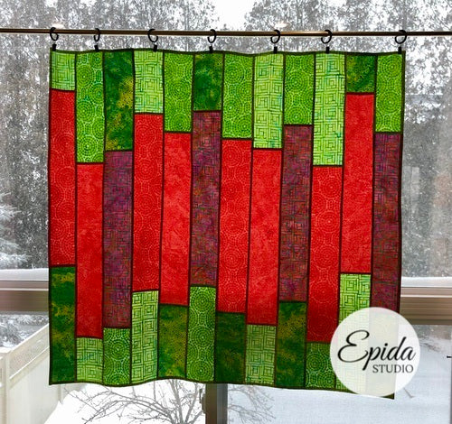 Red and Green "Glimmer" stained glass window hanging.