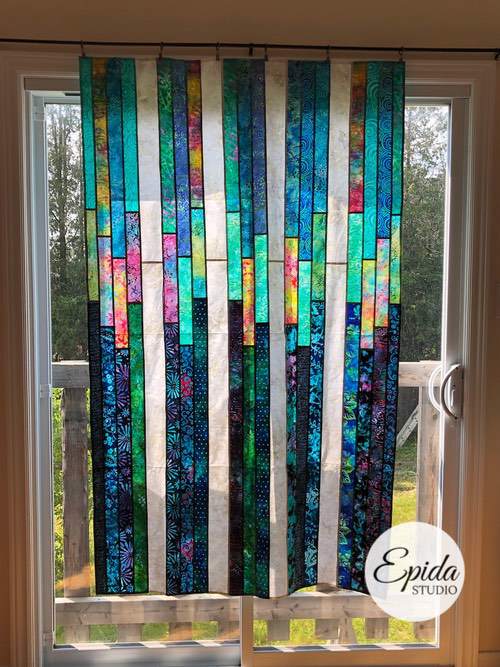 large Shooting Stars window hanging in a window.