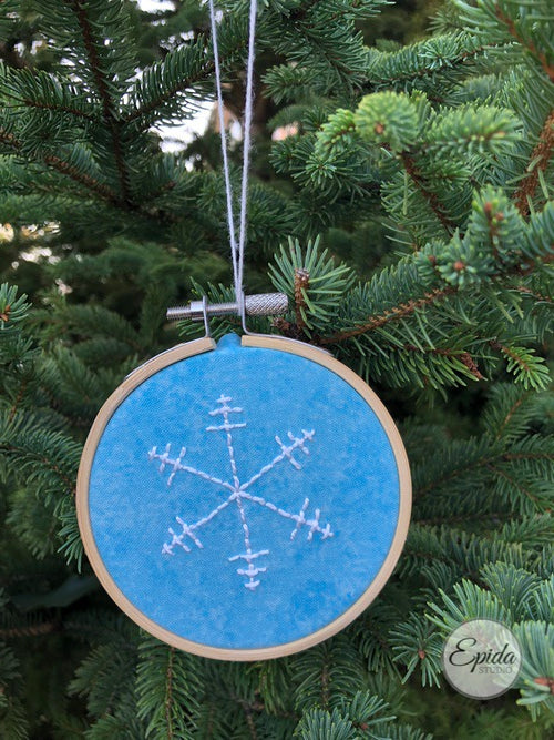 blue and white snowflake ornament.
