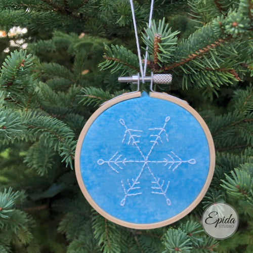 hand embroidered snowflake.