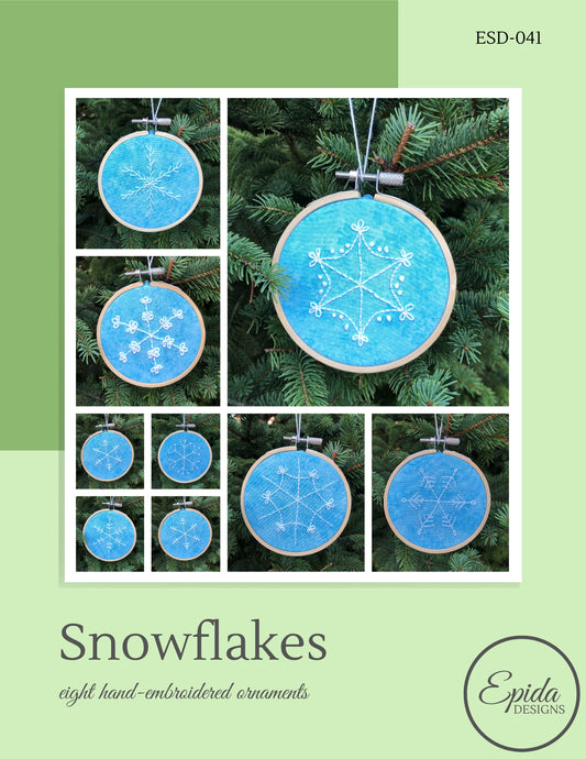embroidered snowflake pattern cover.