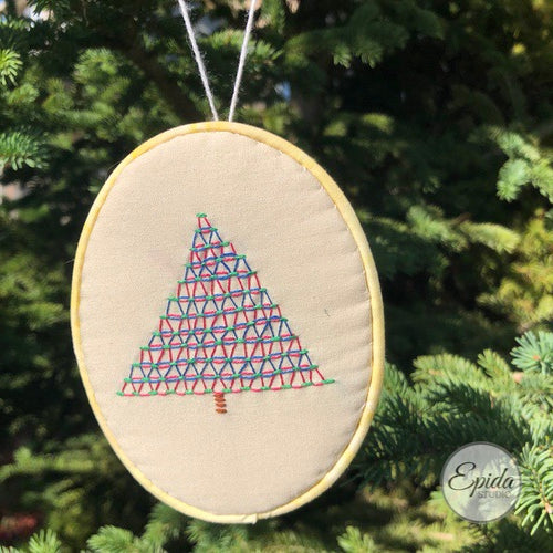 hand stitched Christmas tree ornament.