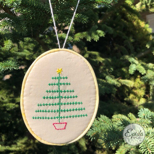 ornament with embroidered Christmas tree.