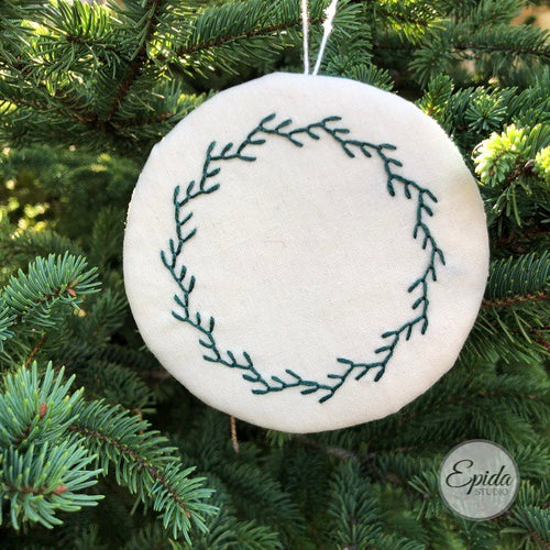 embroidered wreath ornament.