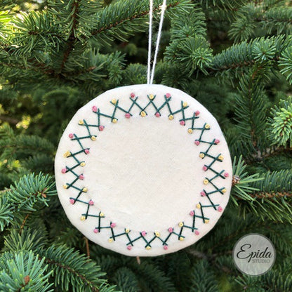 hand embroidered wreath Christmas ornament.