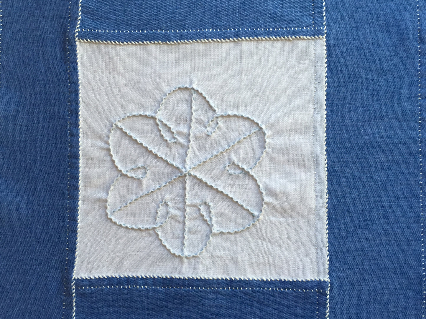 closeup of snowflake on handstitched table runner