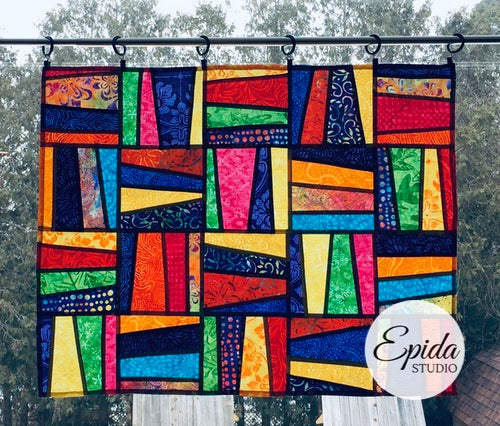 "Weaving" pojagi improv window hanging in a rainbow of colours.