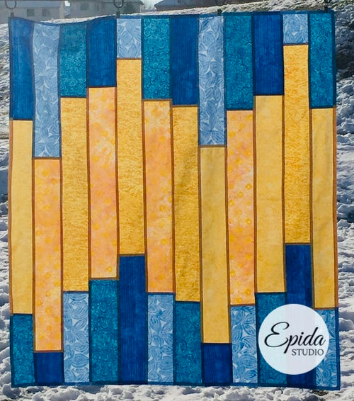 "Glimmer" batik window hanging in blue and yellow.