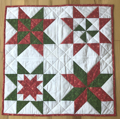 red and green star quilt.