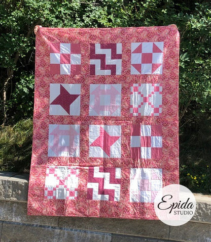 pink sampler quilt.