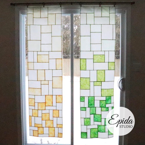 yellow and green patchwork window hangings.